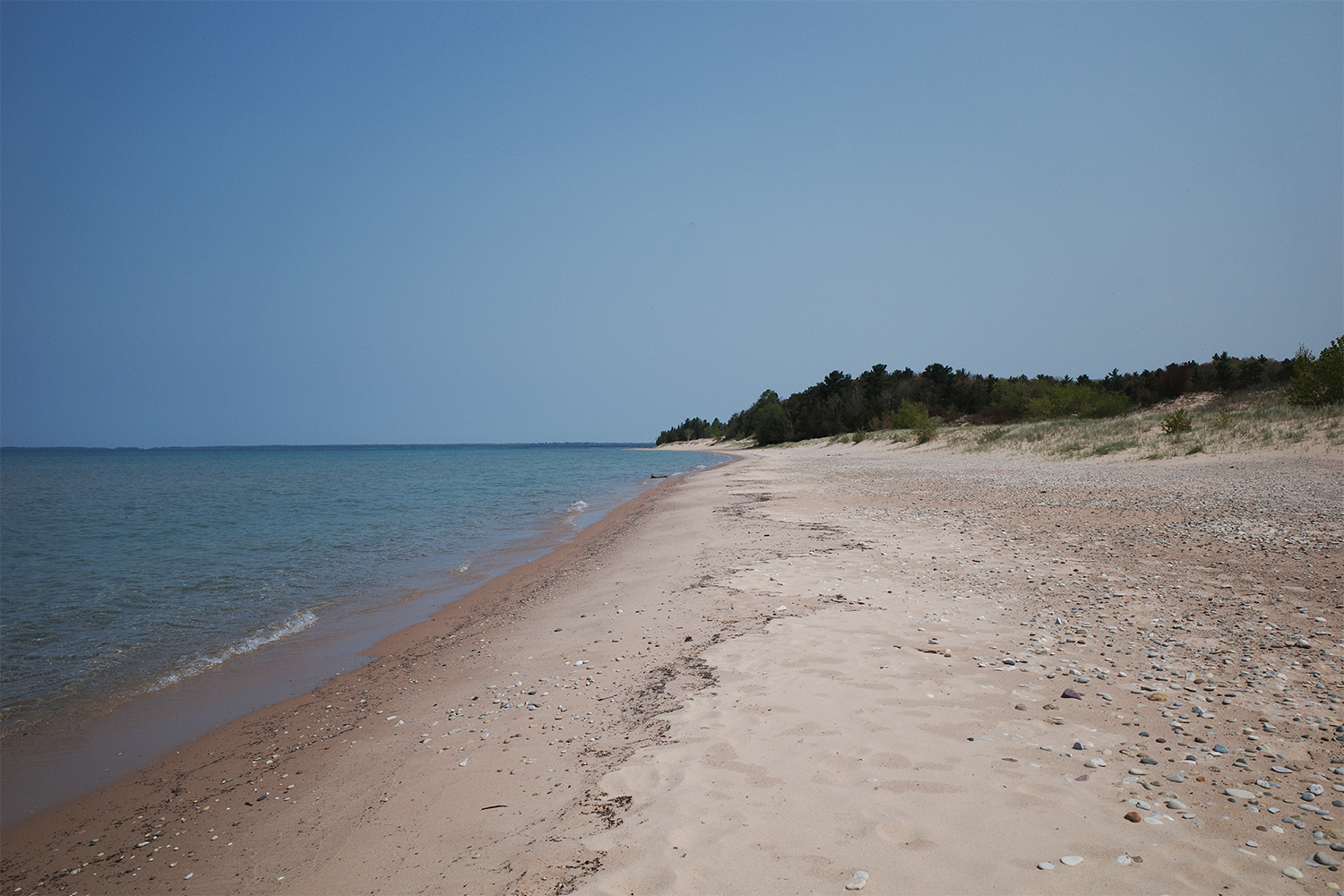 View of beach shoreline off into the distance.