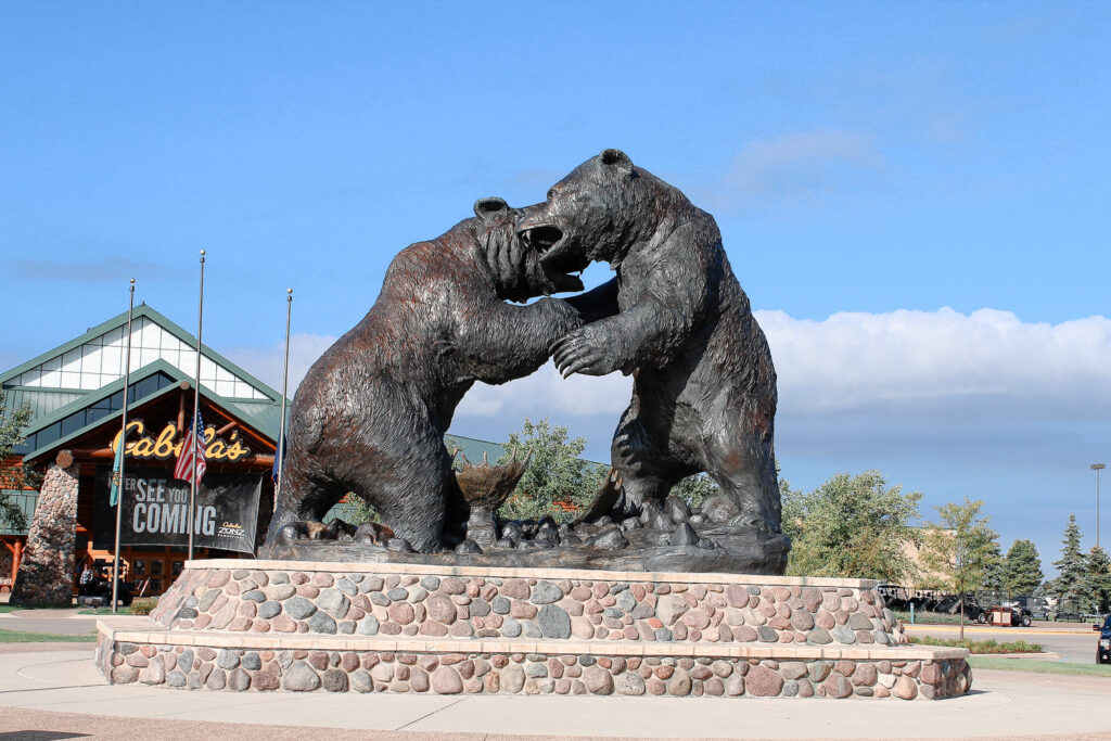 Outside of Cabela's store in Dundee MI with battling bears statue.