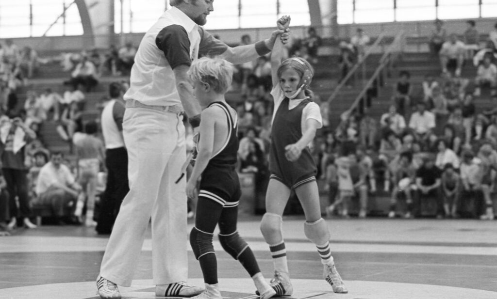 Tricia winning a match in 1975.