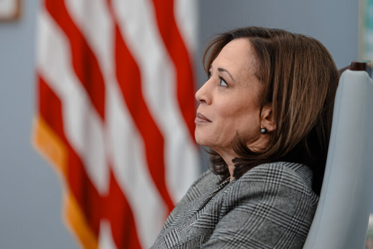 Kamala Harris sitting in chair.