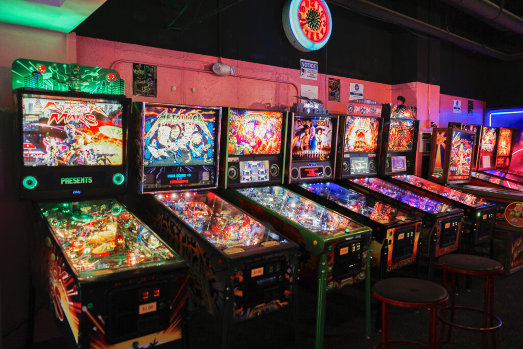 Pinball tables including "Attack From Mars" and "Metallica"