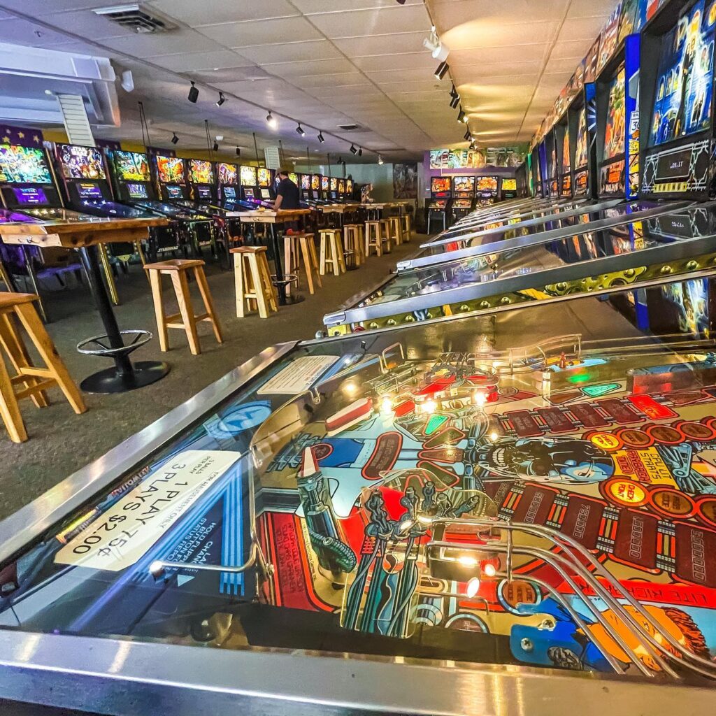 Pinball tables at One Well Brewing.