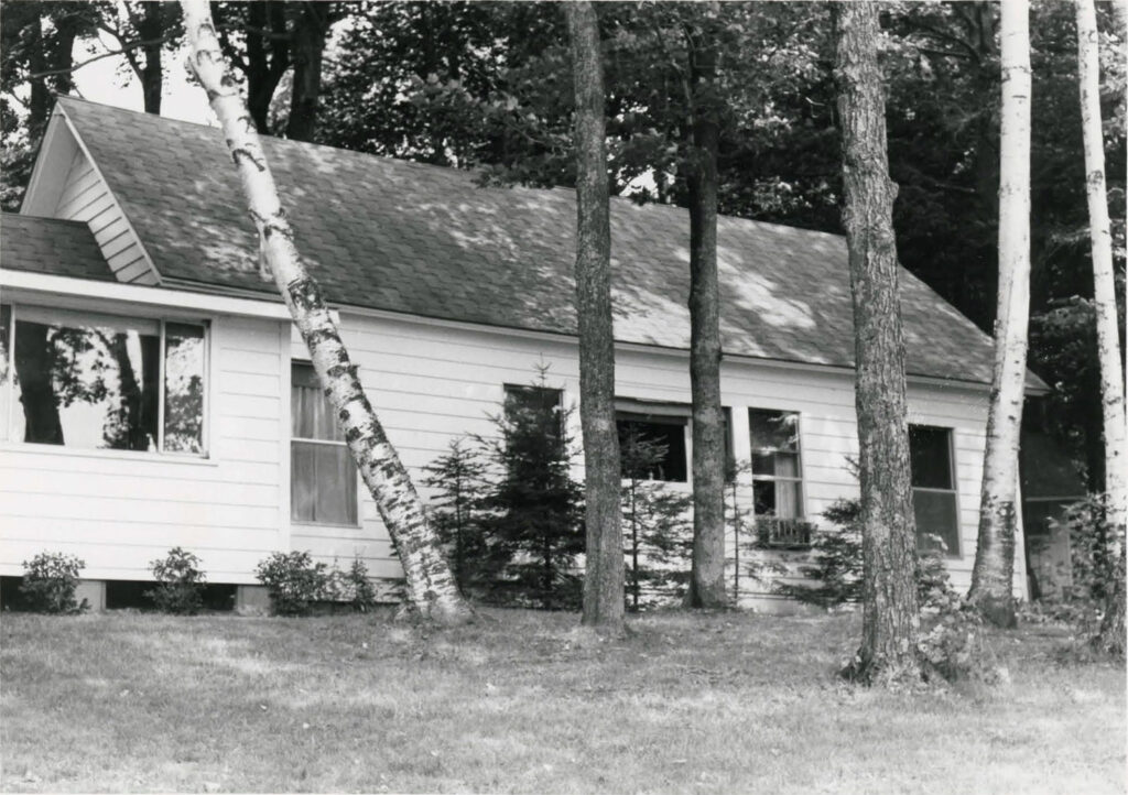 Vintage black and white photo of Hemingway cabin.