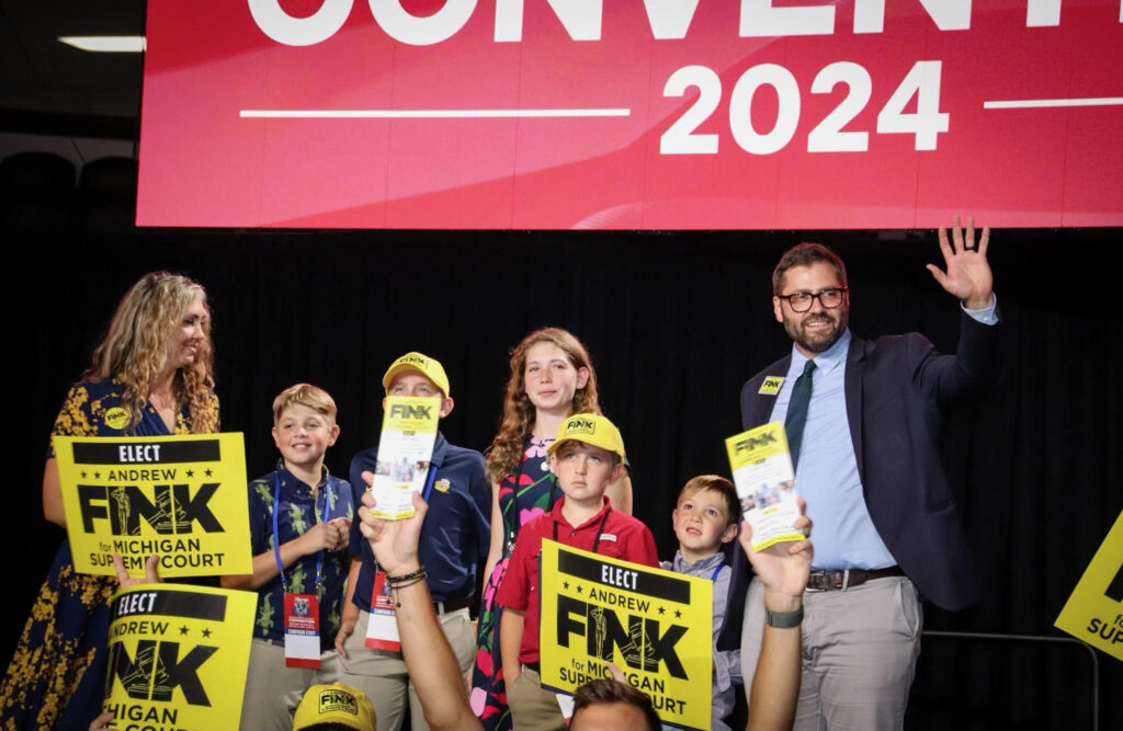 Andrew Fink at campaign rally with family.