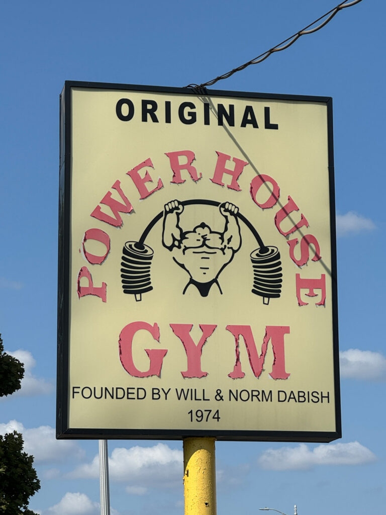 Sign for "Original Powerhouse Gym Founded by Will & Norm Dabish 1974"