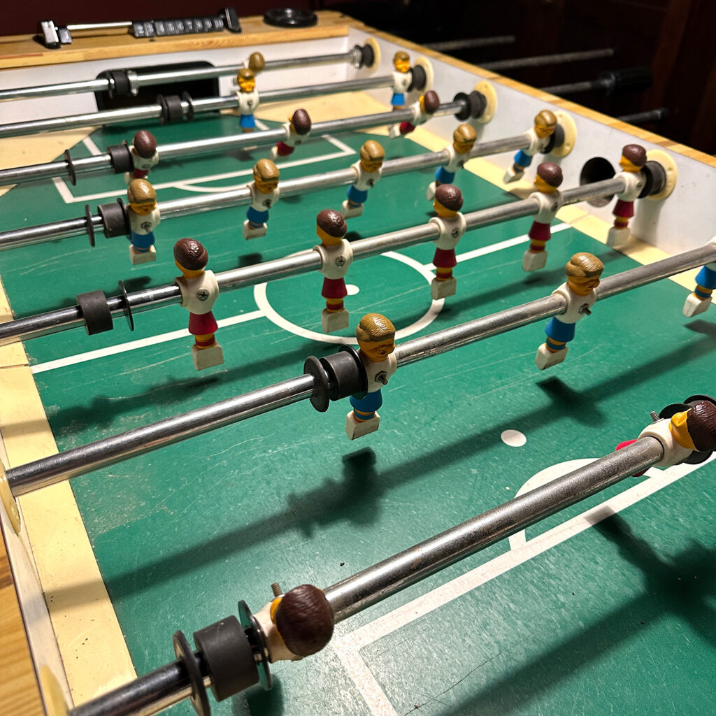 Closeup of Foosball table.