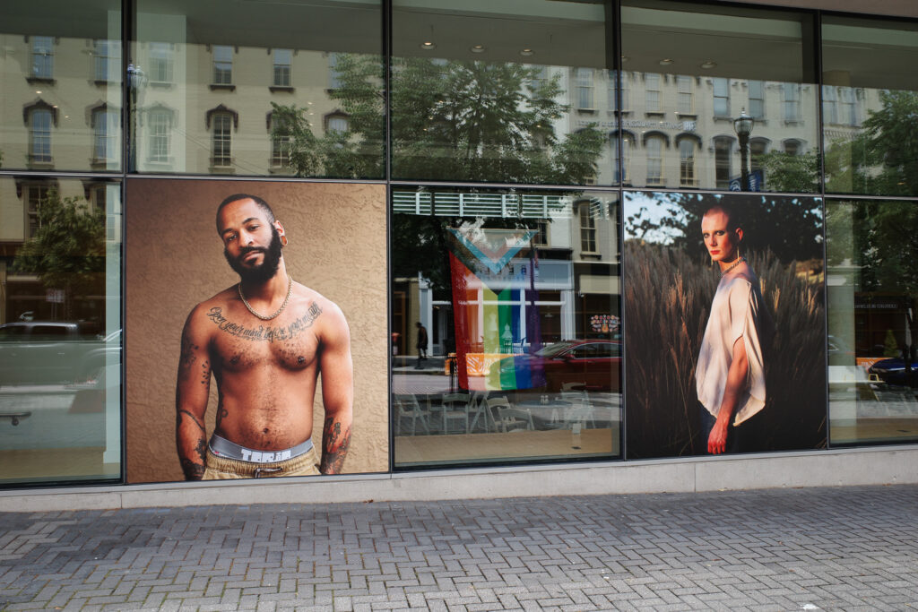 View of Jess Dugan's exhibition on exterior of GRAM.