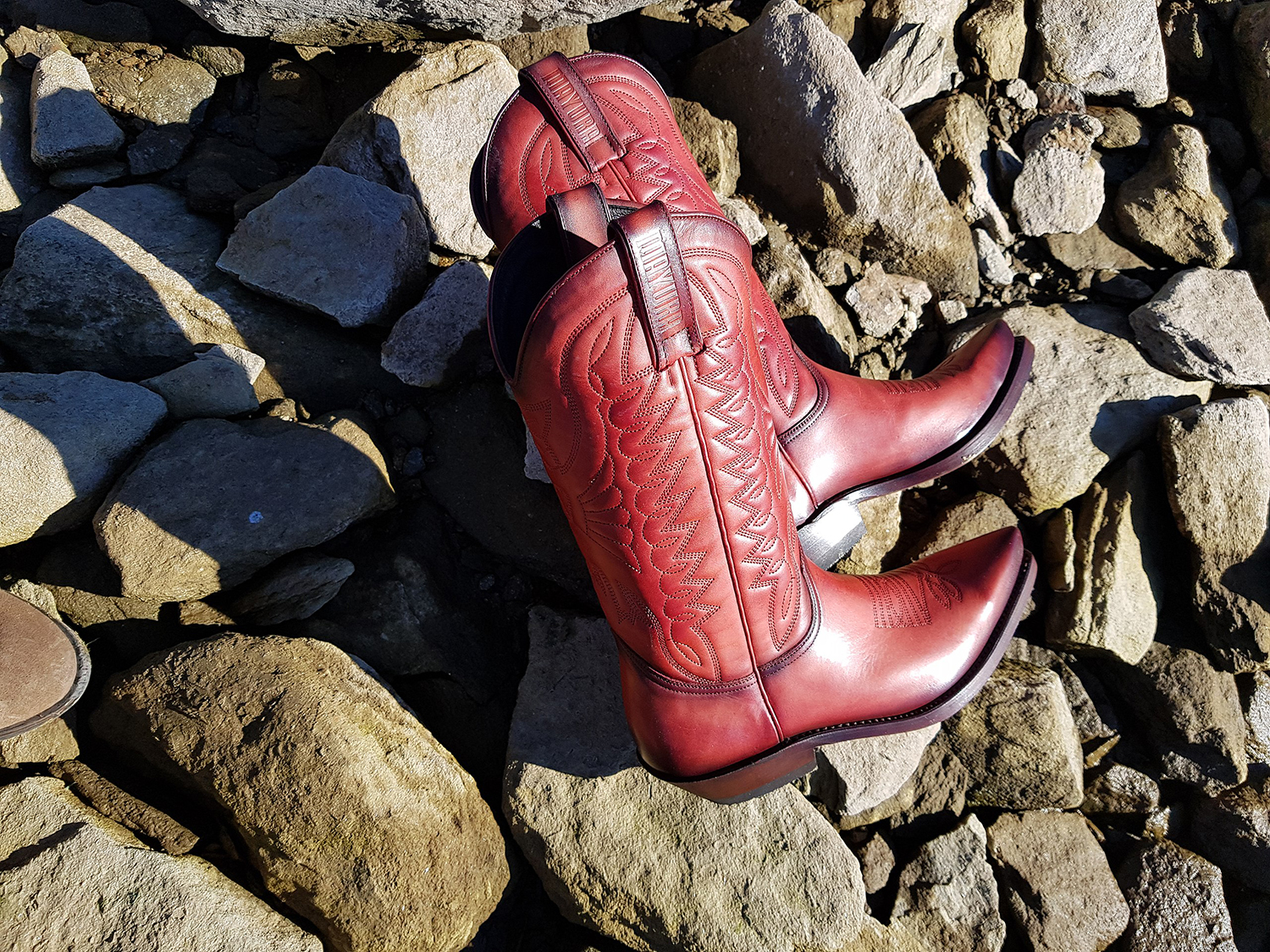 Pair of red cowboy boots.