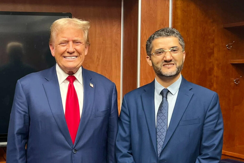 Donald Trump and Amer Ghalib posing for photo.