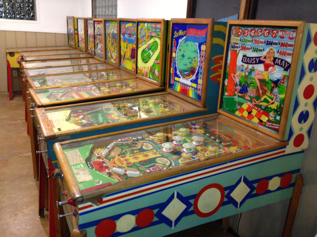 Old wooden railed pinball tables at VFW