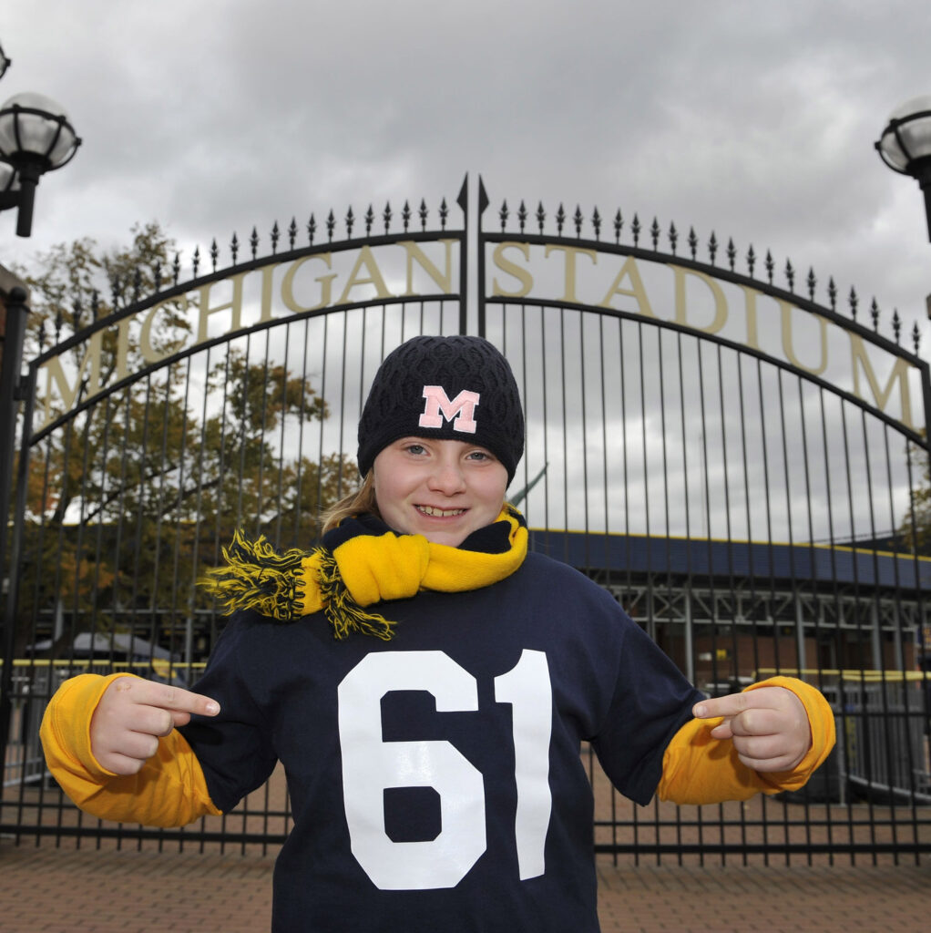 Genna Urbain in Willis Ward jersey outside Michigan Stadium