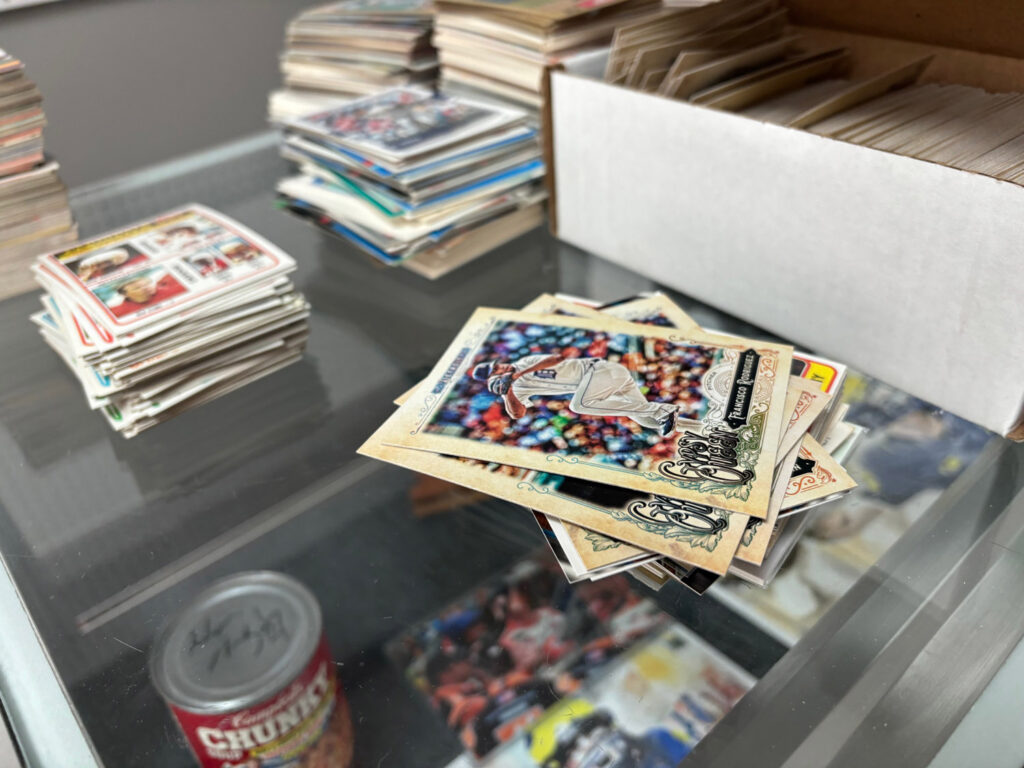 Stack of baseball cards on glass table