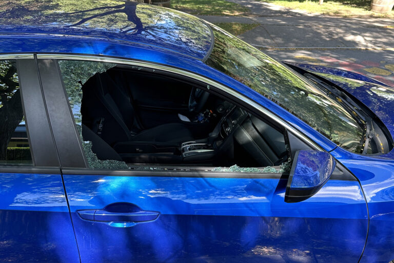 Smashed passenger side car window.