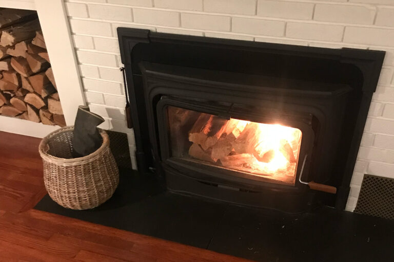 Wood stove fireplace burning.