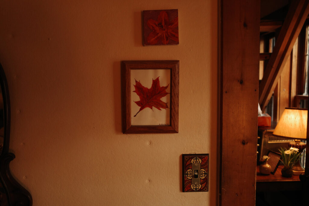 Leaf wall art on cabin