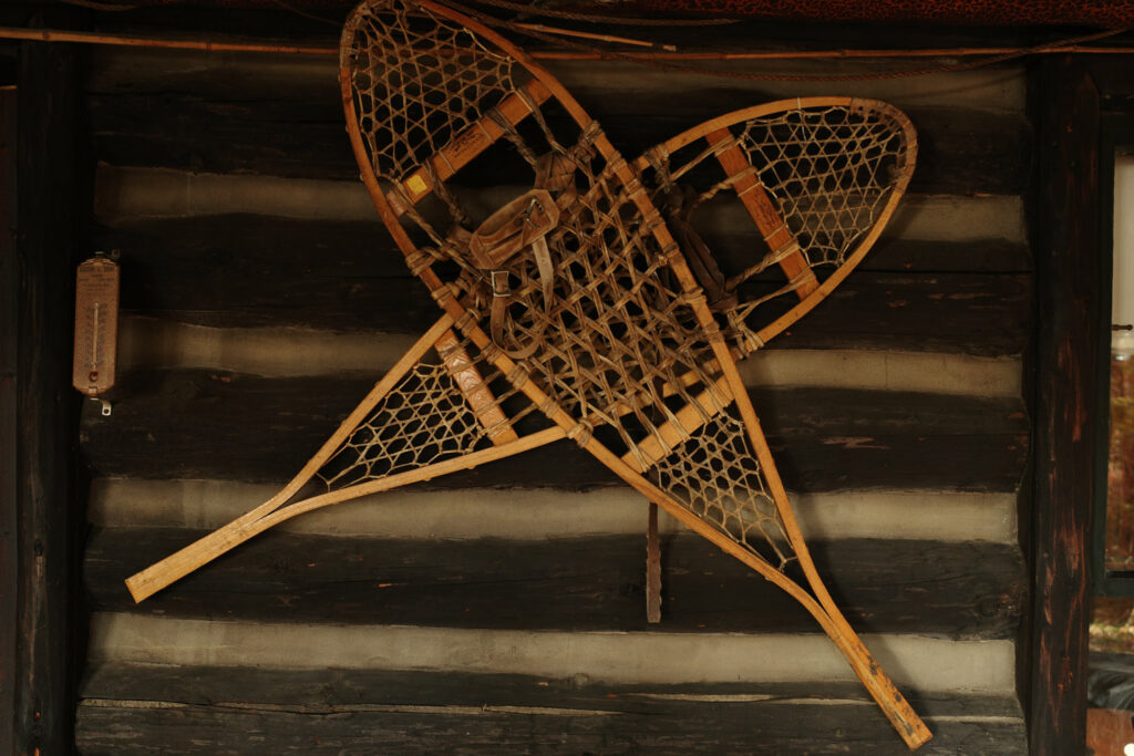 Old snowshoes on wall