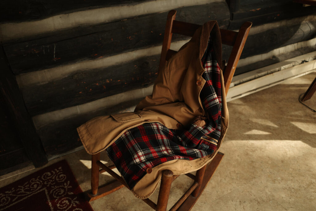 Chair in cabin with coat across it