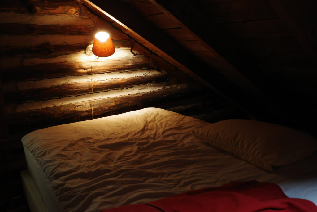 Mattress in cabin attic