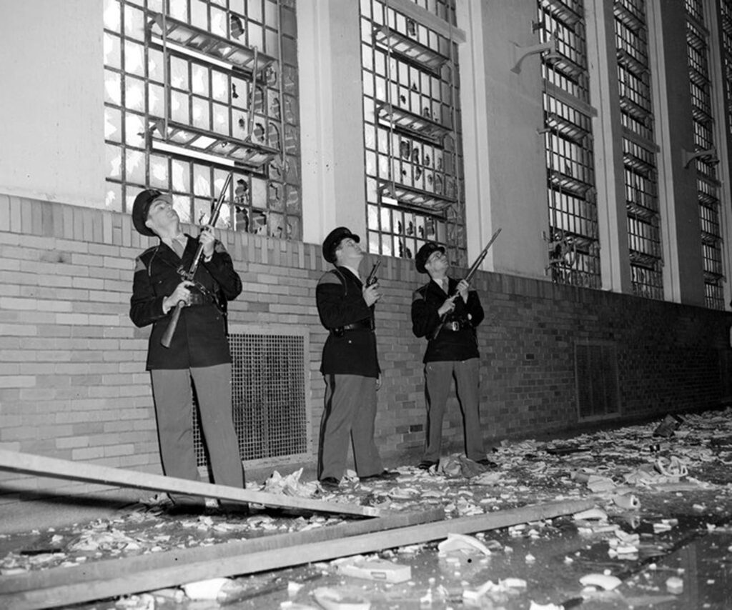 Prison guards with rifles