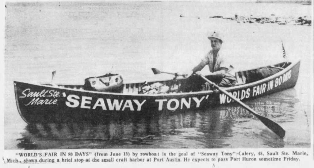 Newsprint photo of Tony in boat reading "Sault Ste SEAWAY TONY' WORLDS FAIR IN BOMIS
Marie
"WORLD'S FAIR IN 80 DAYS" (from June 13) by rowboat is the goal of "Seaway Tony" Calery, 45, Sault Ste. Marie, Mich., shown during a brief stop at the small craft harbor at Port Austin. He expects to pass Port Huron sometime Friday."