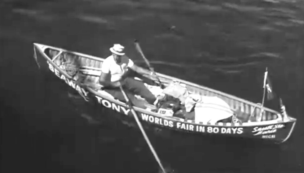 Tony in boat reading on side "Seaway Tony Worlds Fair in 80 Days"