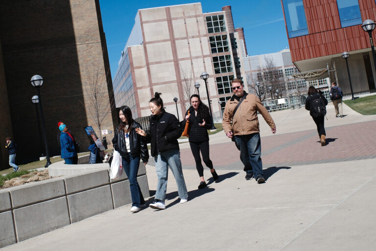 Students walking on U-M campus.