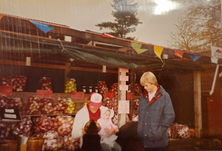 1980s photo at Klackle's farm with men and children