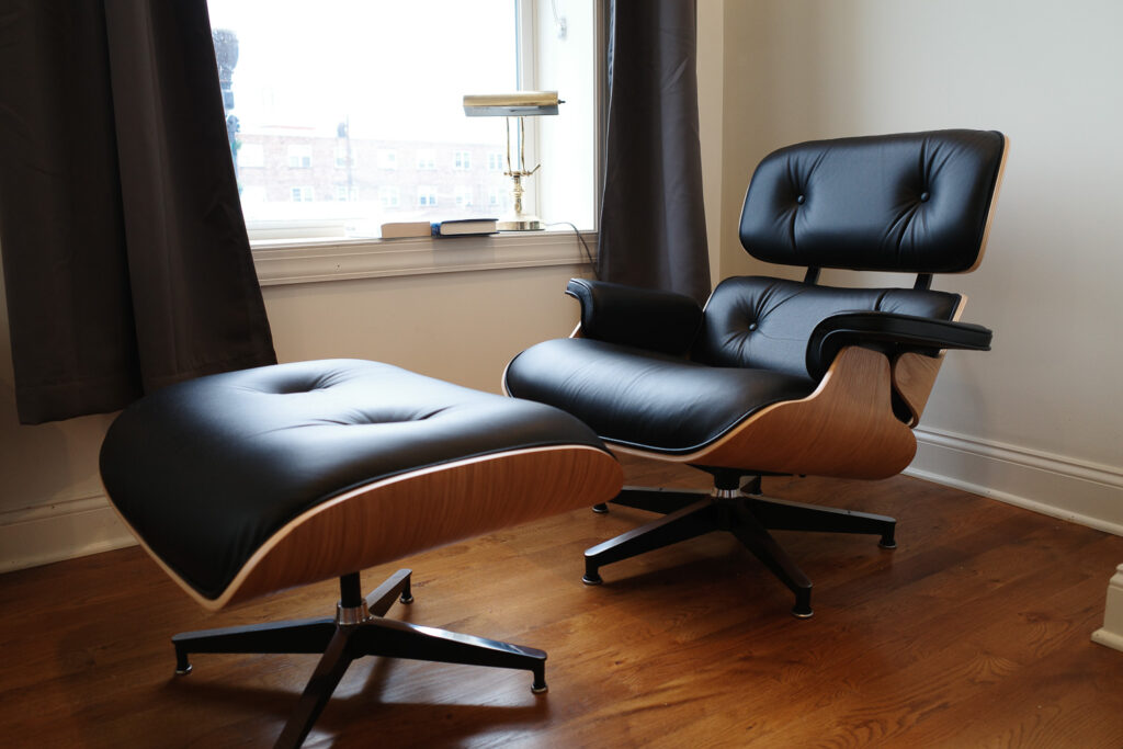 Eames Lounge chair and ottoman in apartment.