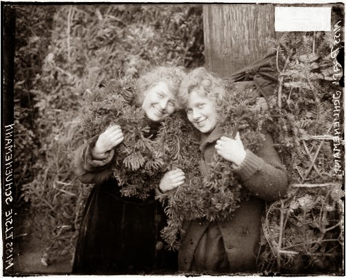 Two girls with wreaths