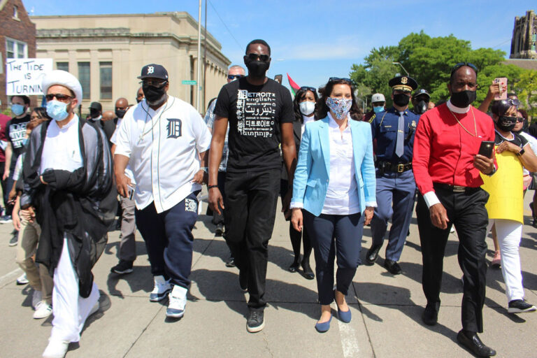 Governor Gretchen Whitmer marching in black lives matter protest