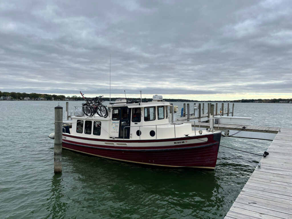 Boat tied in dock.