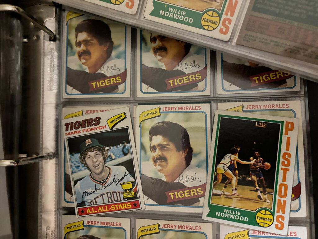 tigers and pistons baseball cards in binder