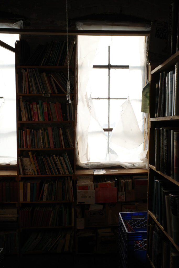 Bright window panes in dark bookstore