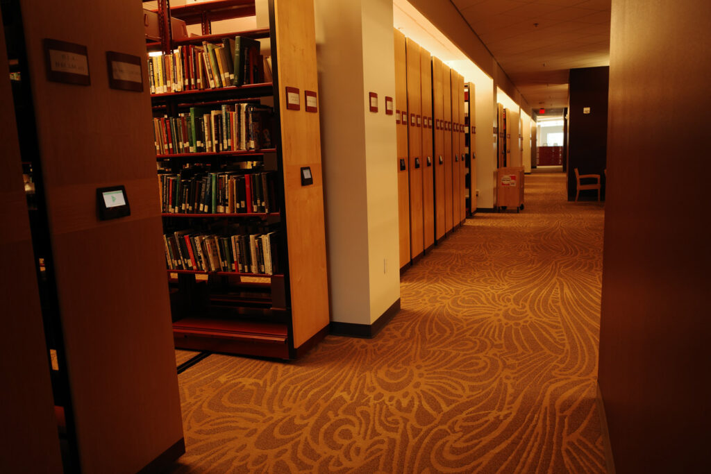 Stacks of books in CMU Library