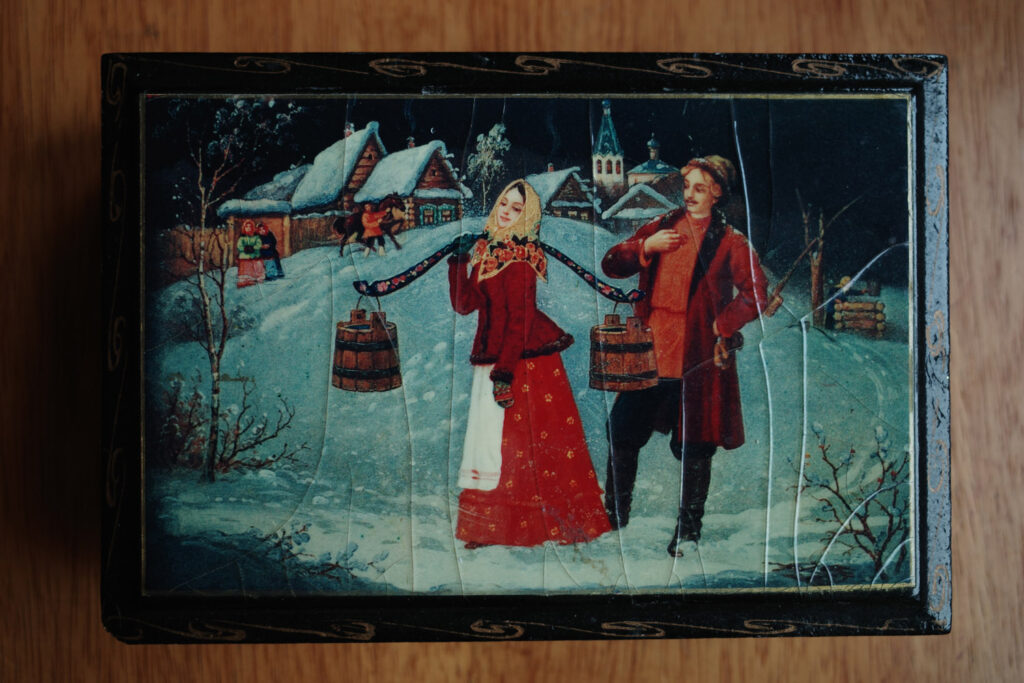 Wall art of Danish couple dressed for winter outdoors