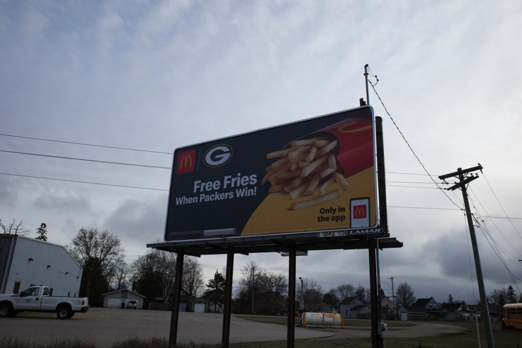 McDonald's billboard saying "Free fries when packers win!"