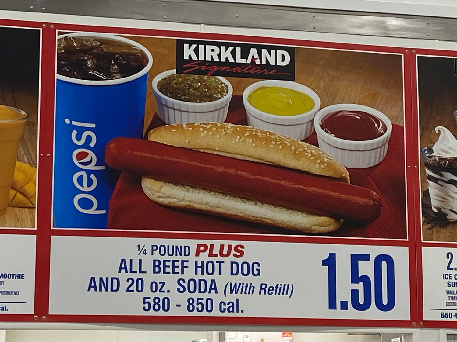 Sign for Kirkland Signature all beef hot dog plus 20oz soda for $1.50