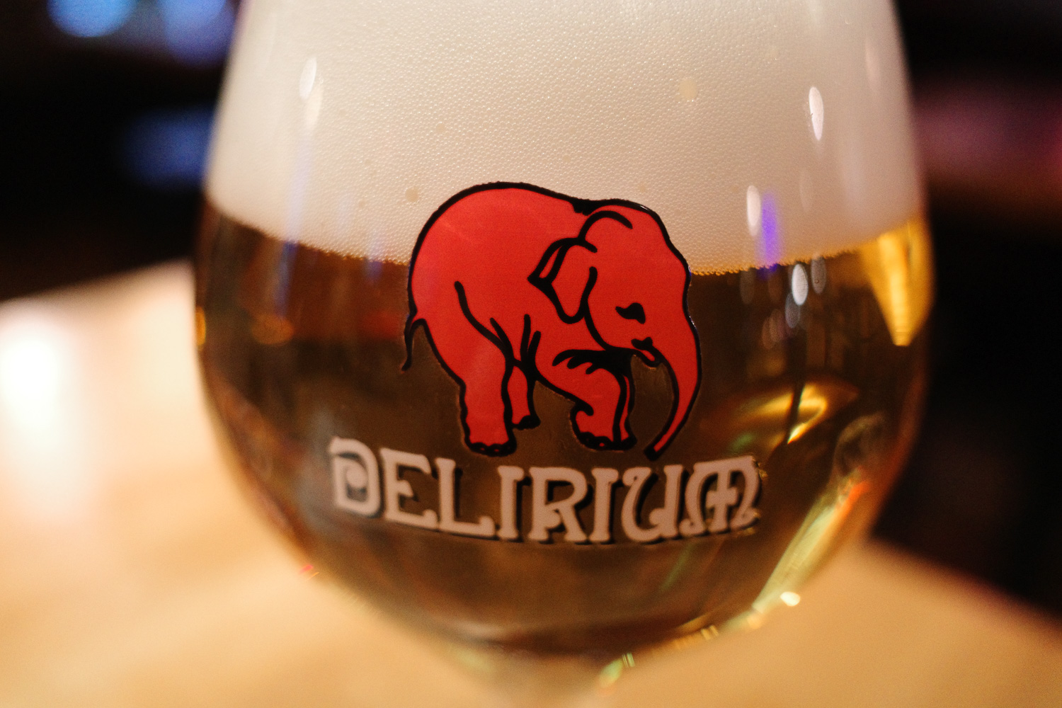 Delirium Tremens logo on glass filled with beer