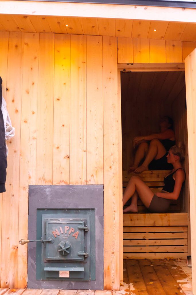 People inside wood fired sauna