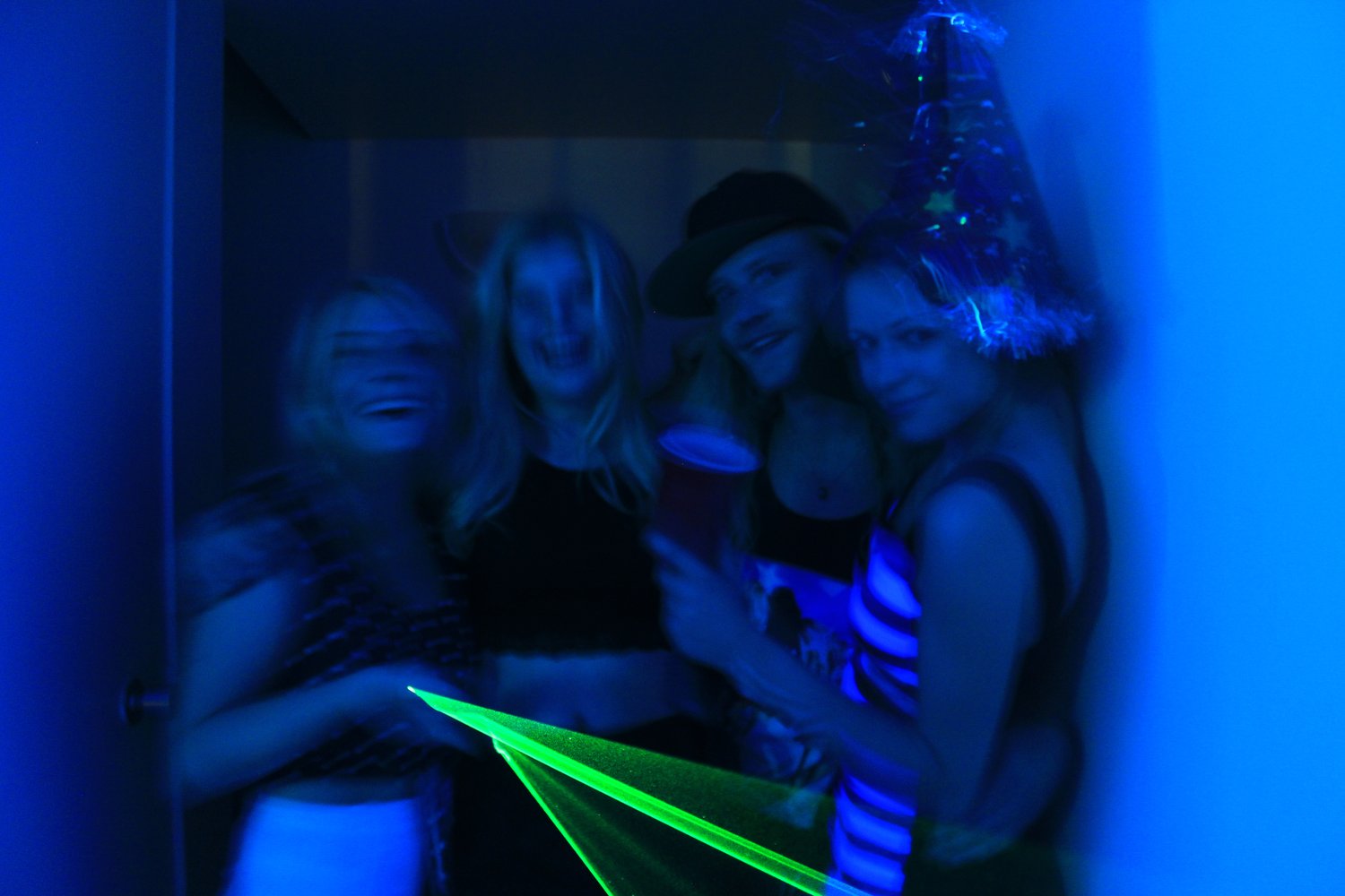 group at party with laser pointer