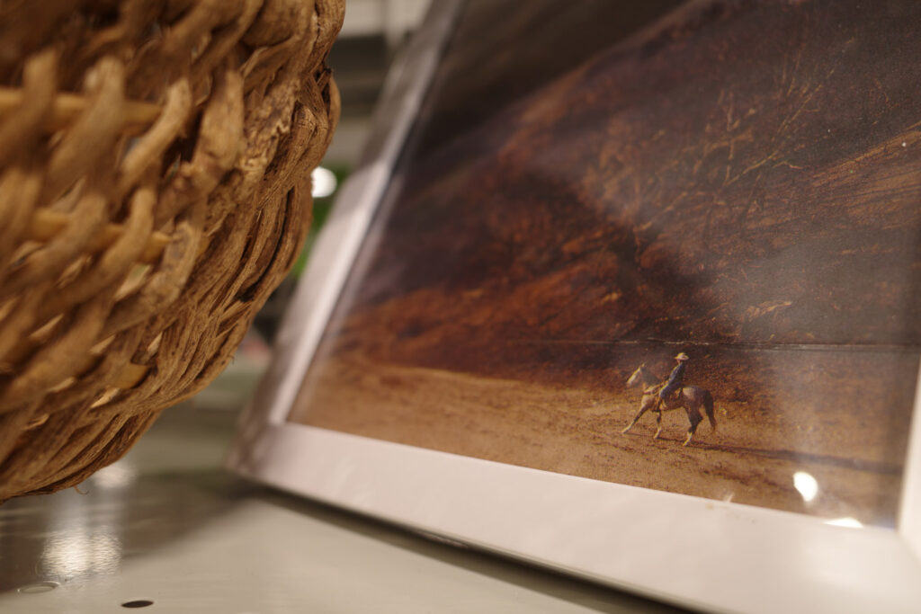 vintage wicker basket and picture frame with old west photo