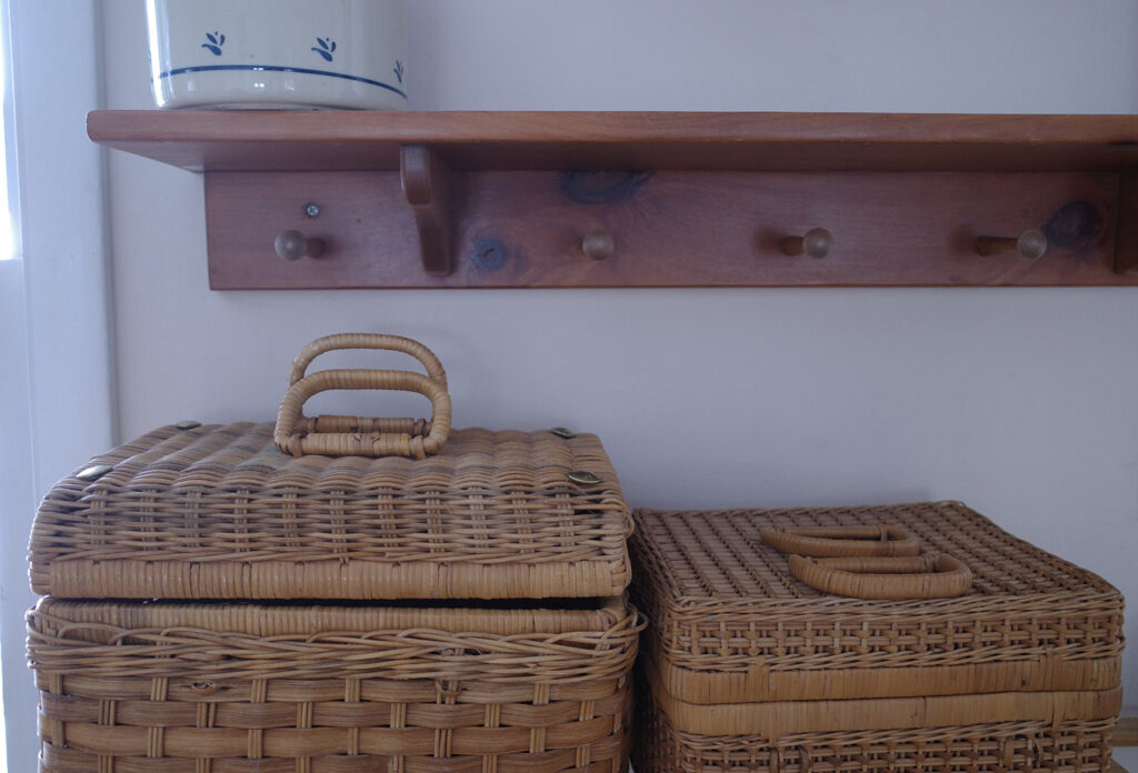 vintage wall shelf and wicker baskets