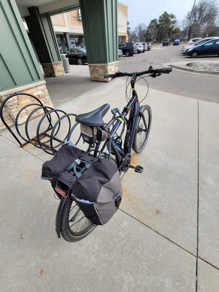 e-bike parked outside grocery store