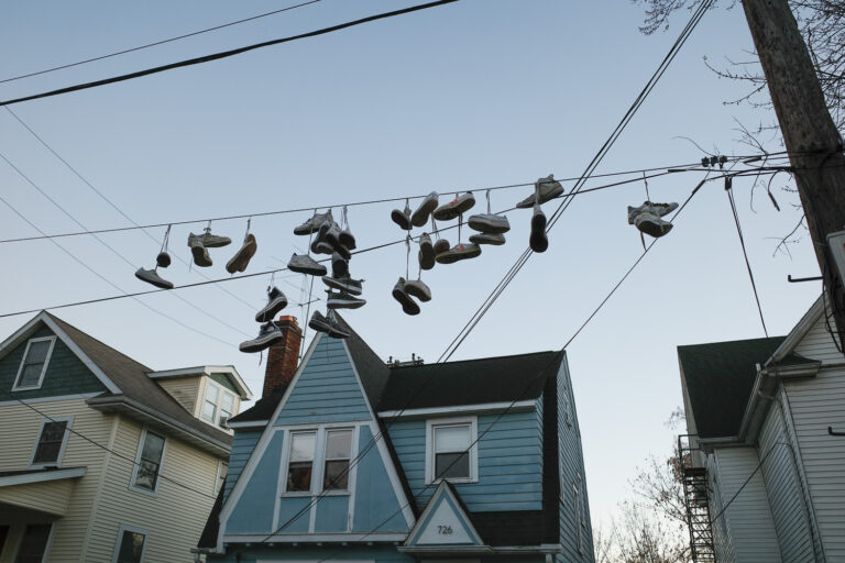 Shoes hanging on power lines