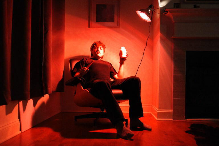 Bobby under red light with carrot and aspirin