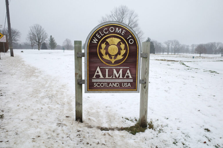 Sign saying welcome to Alma, Scotland USA