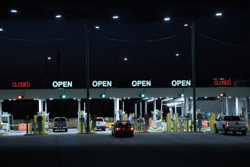 U.S. Border Entry with green "open" signs in Detroit.