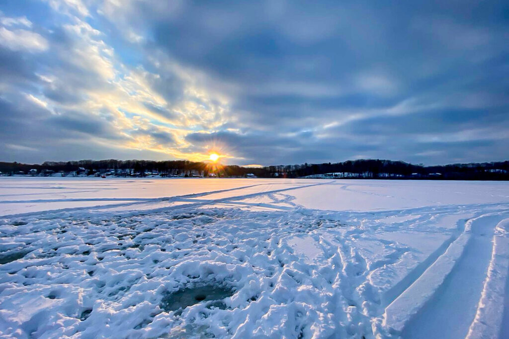 Hole in ice on lake