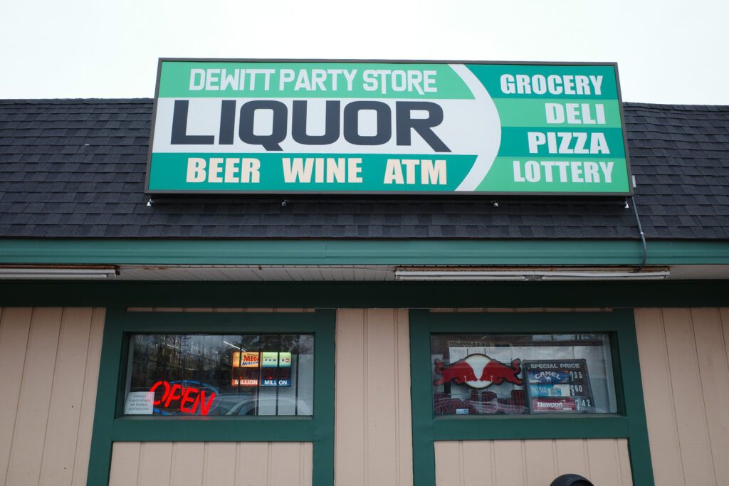 dewitt party store sign