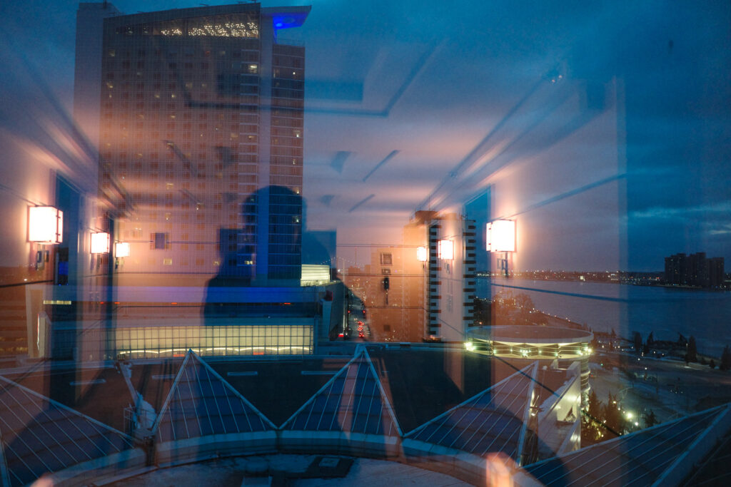 view of windsor with reflection of hotel in window